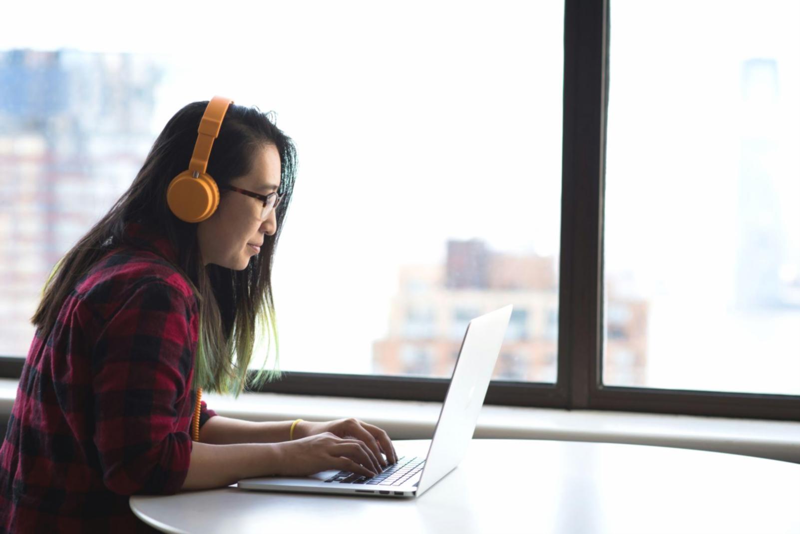 Modern workspace showing financial planning tools and automated systems setup